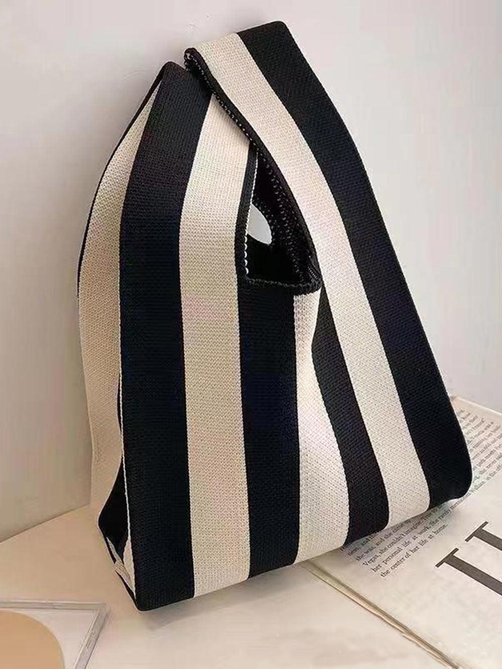 GIULIA | Borsa a secchiello con design moderno 0