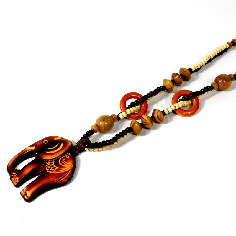 GIULIA | Collana in legno con pendente intrecciato 3