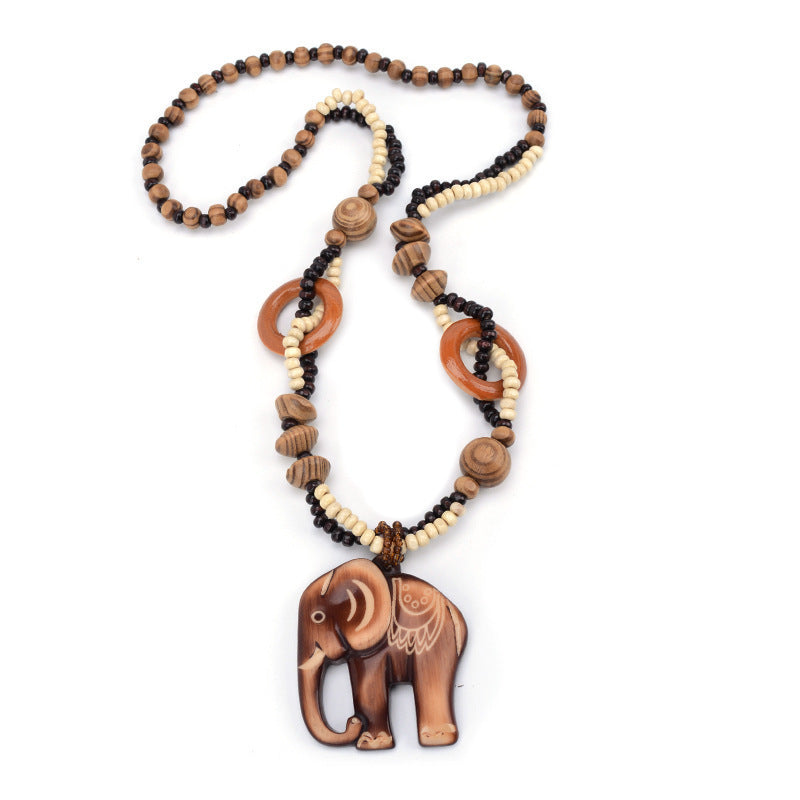 GIULIA | Collana in legno con pendente intrecciato 4